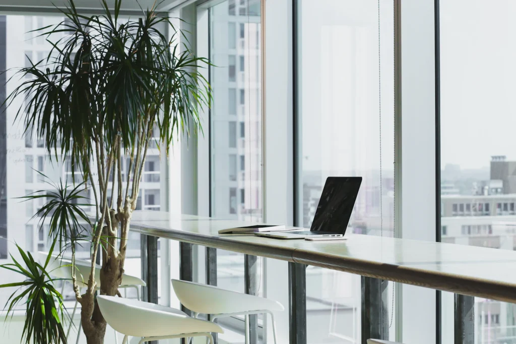 Rows of dedicated desks in an office loft